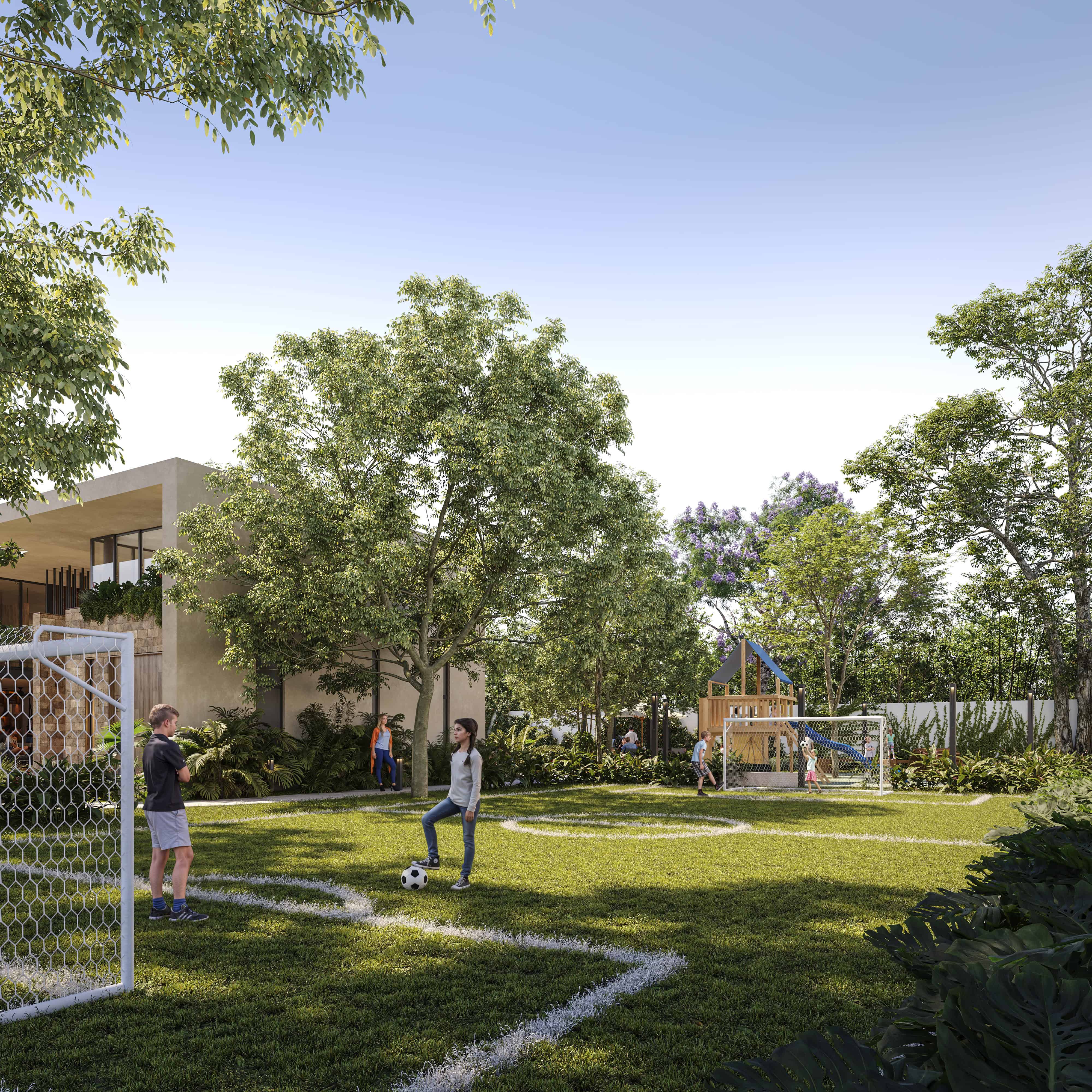 Cancha de Football con césped verde y cielo azul